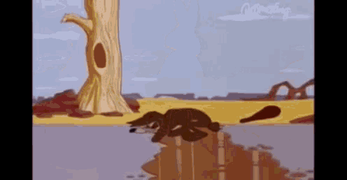 a cartoon dog is laying in a puddle of water in front of a tree .