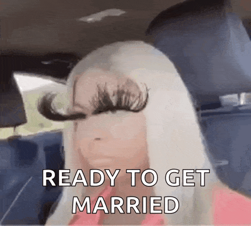 a woman with very long eyelashes is sitting in a car and ready to get married .