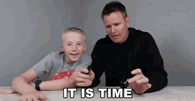 a man and a boy are sitting at a table with the words " it is time " written on the bottom