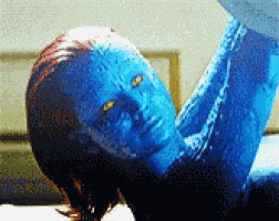 a woman with blue paint on her face is laying down