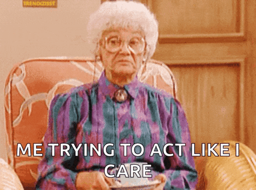 an elderly woman is sitting in a chair with a sign that says trendzist