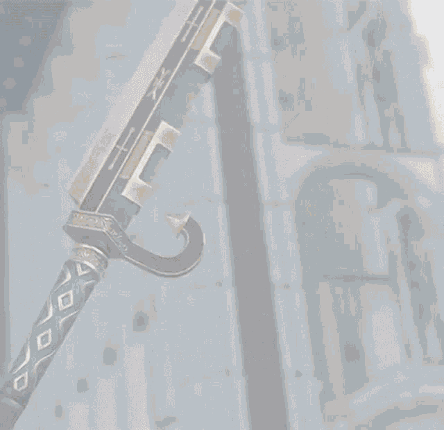 a woman is holding a sword with a blue handle