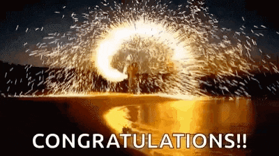 a fireworks display with the words congratulations written on the bottom