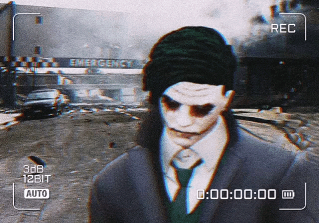 a video of a man in a suit and tie is being recorded at 3db 12bit and auto