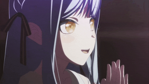 a close up of a girl with purple hair