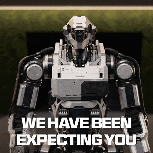 a robot with the words we have been expecting you on the bottom