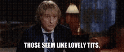 a man is looking at a woman 's breasts in a mirror and says those seem like lovely tits .