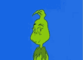 a green cartoon character with a bunny ear on a blue background .