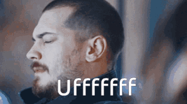 a man with a beard is making a funny face and the word uffffff is written below him