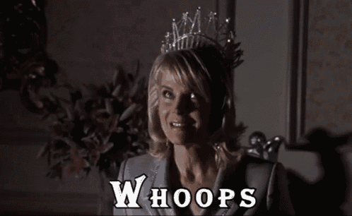 a woman wearing a tiara says whoops in white letters