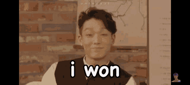 a young man is making a funny face and says i won