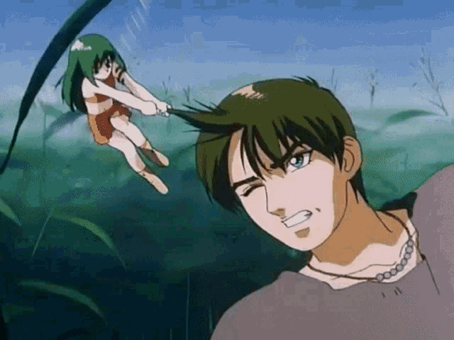 a man and a girl are standing in a field