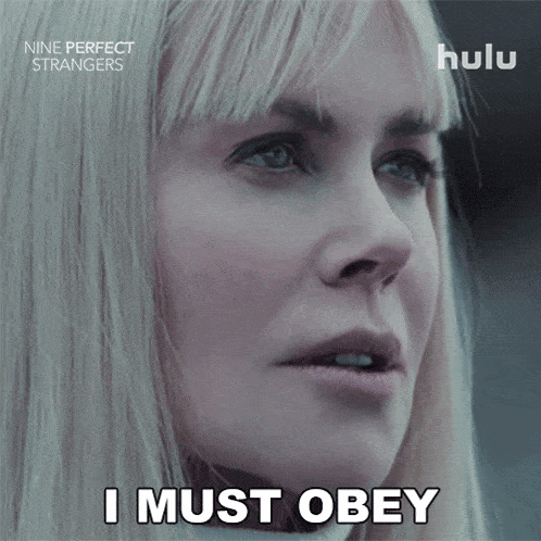 a close up of a woman 's face with the words " i must obey " above her