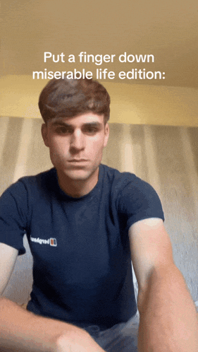 a man wearing a t-shirt that says ' berghaus ' on it