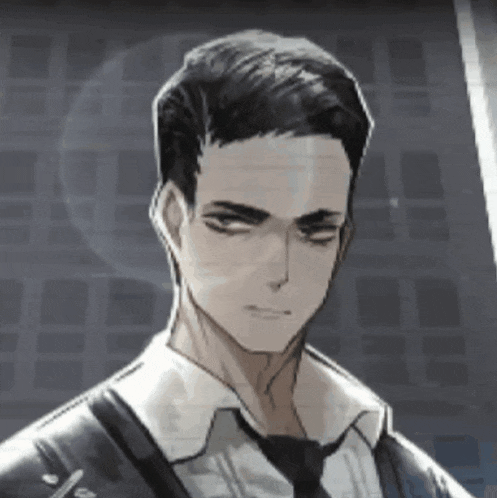 a man in a suit and tie with a serious look on his face