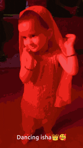 a little girl in a red dress is dancing with the caption dancing ishaw