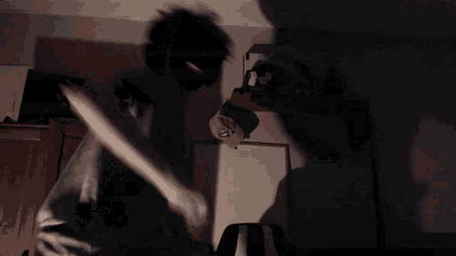 a blurry picture of a person in a room