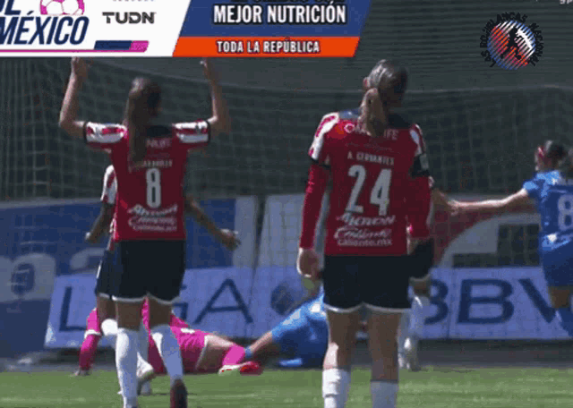 a soccer player with the number 24 on her shirt