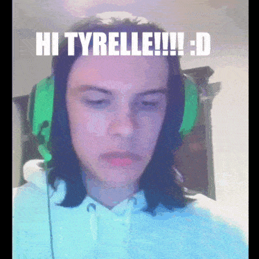 a young man wearing green headphones says hi tyrelle !!!