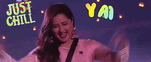 a woman in a pink dress is dancing in front of a sign that says just chill ya !