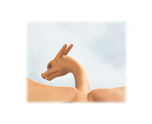 a close up of a toy dragon 's head with a blue sky in the background