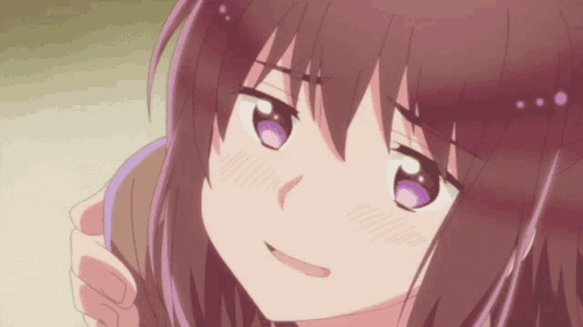 a close up of a girl with purple eyes making a face