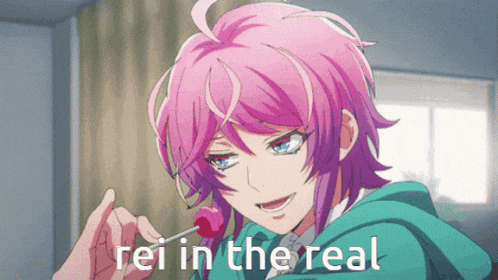 a girl with pink hair is eating a lollipop with the words rei in the real written below her