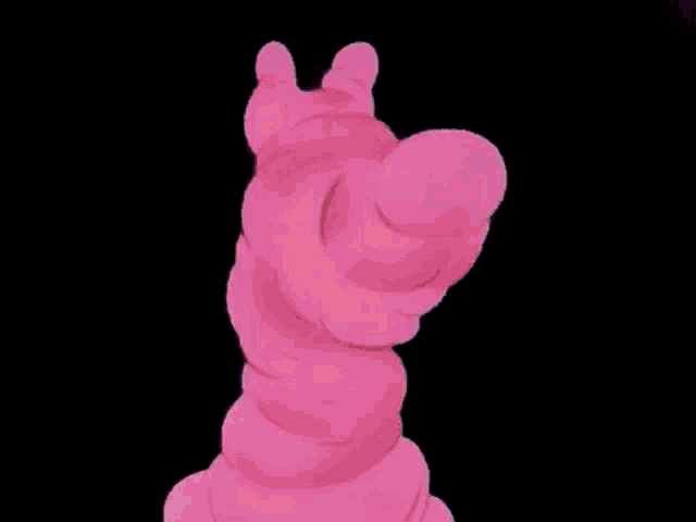 a cartoon character with a pink flamingo 's tongue coming out of its mouth is being sprayed with water .