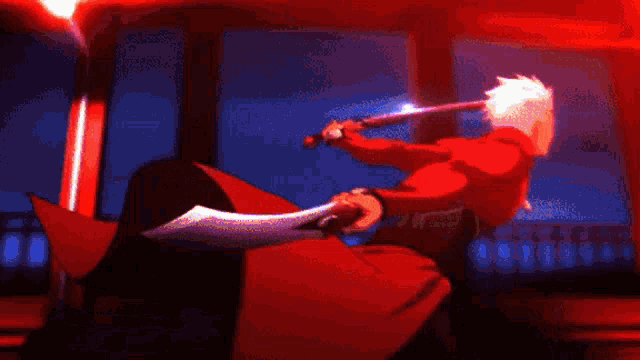 a man in a red shirt is holding a sword in a red room
