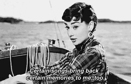 a black and white photo of a woman on a boat with the words " certain songs bring back certain memories to me too " below her