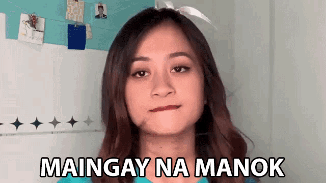 a woman making a funny face with the words maingay na manok written on the bottom