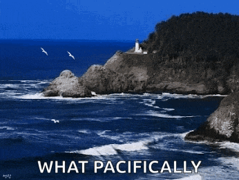 a lighthouse sits on top of a cliff overlooking the ocean