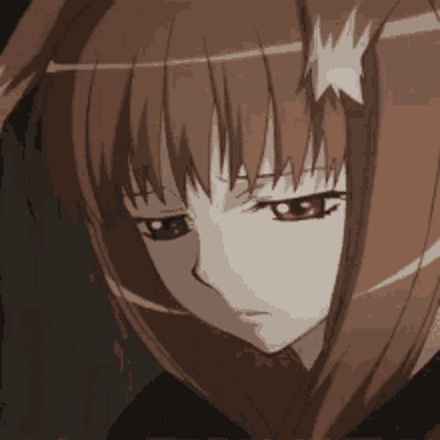 a close up of a girl with brown hair and a star on her head
