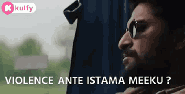 a man wearing sunglasses is sitting in front of a window with the words " violence ante istama meeku " written below him