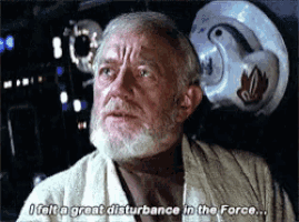 a man with a beard and a helmet on his head says " i felt a great disturbance in the force "