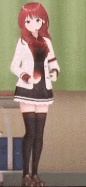 a red haired anime girl is standing in a classroom .
