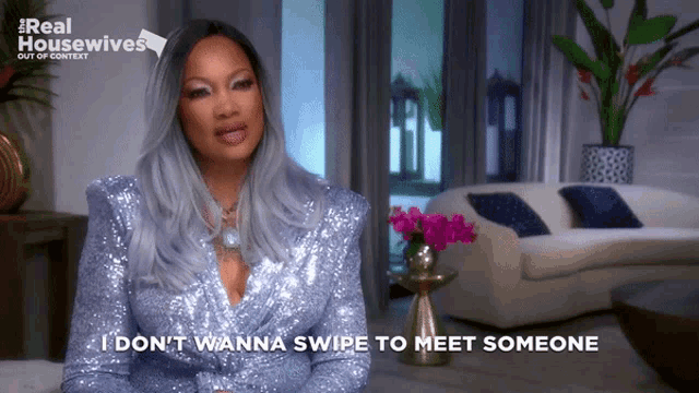 a woman says " i don t wanna swipe to meet someone " in front of a couch