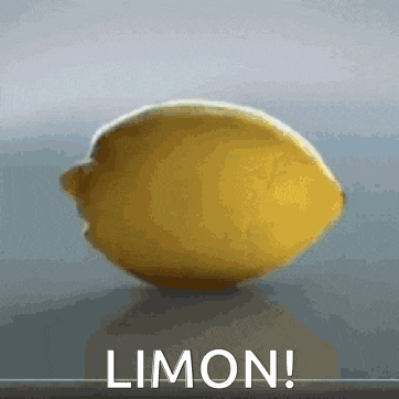 a lemon is on a table with the word limon below it