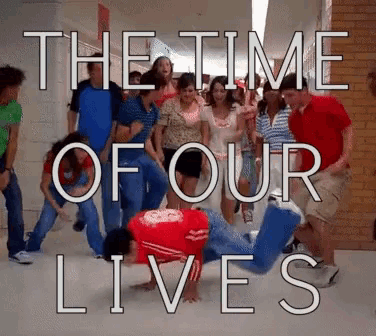 a group of people dancing in a hallway with the words " the time of our lives "