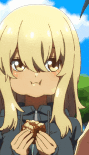 a girl with blonde hair is holding a piece of cake in her hands