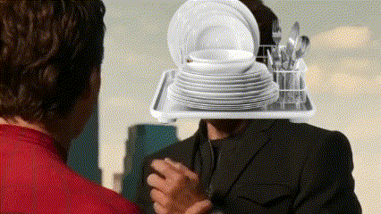 a man in a suit has a tray of plates and silverware on his head