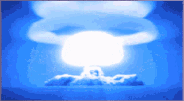 a picture of a nuclear explosion with the word atomic visible