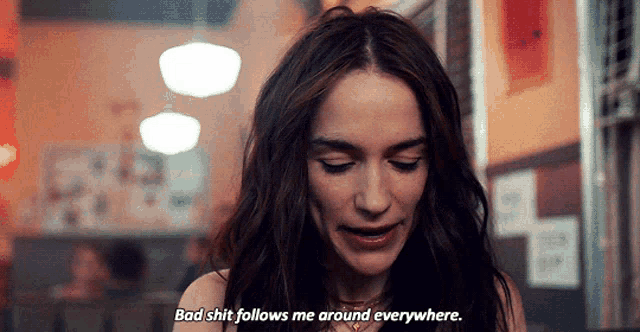 a woman in a restaurant says bad shit follows me around everywhere