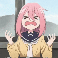 a girl with pink hair is crying and making a face