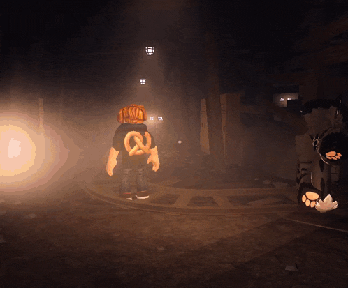 a person with a pretzel on their back is walking in the dark