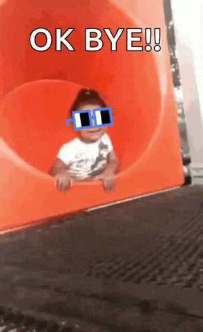 a child wearing sunglasses on a slide with the words ok bye written on it