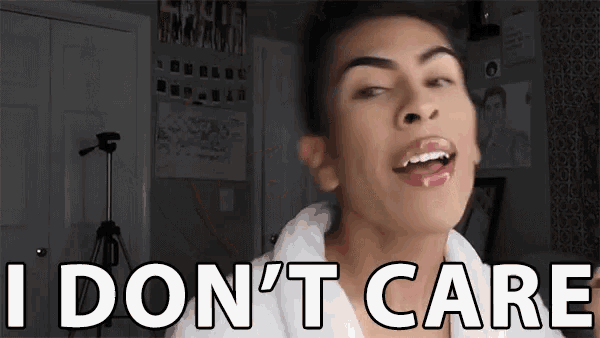 a young man is making a funny face and saying i don 't care .