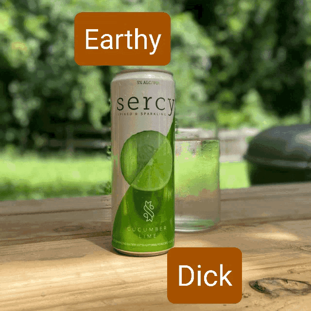 a can of sercy cucumber lime is on a wooden table