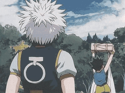 a man with the letter k on his back is holding a box