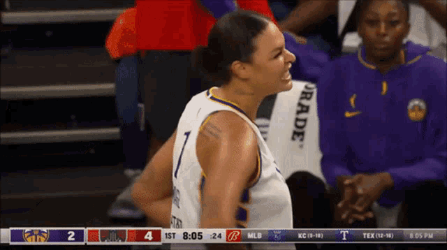 a female basketball player with the number 1 on her back